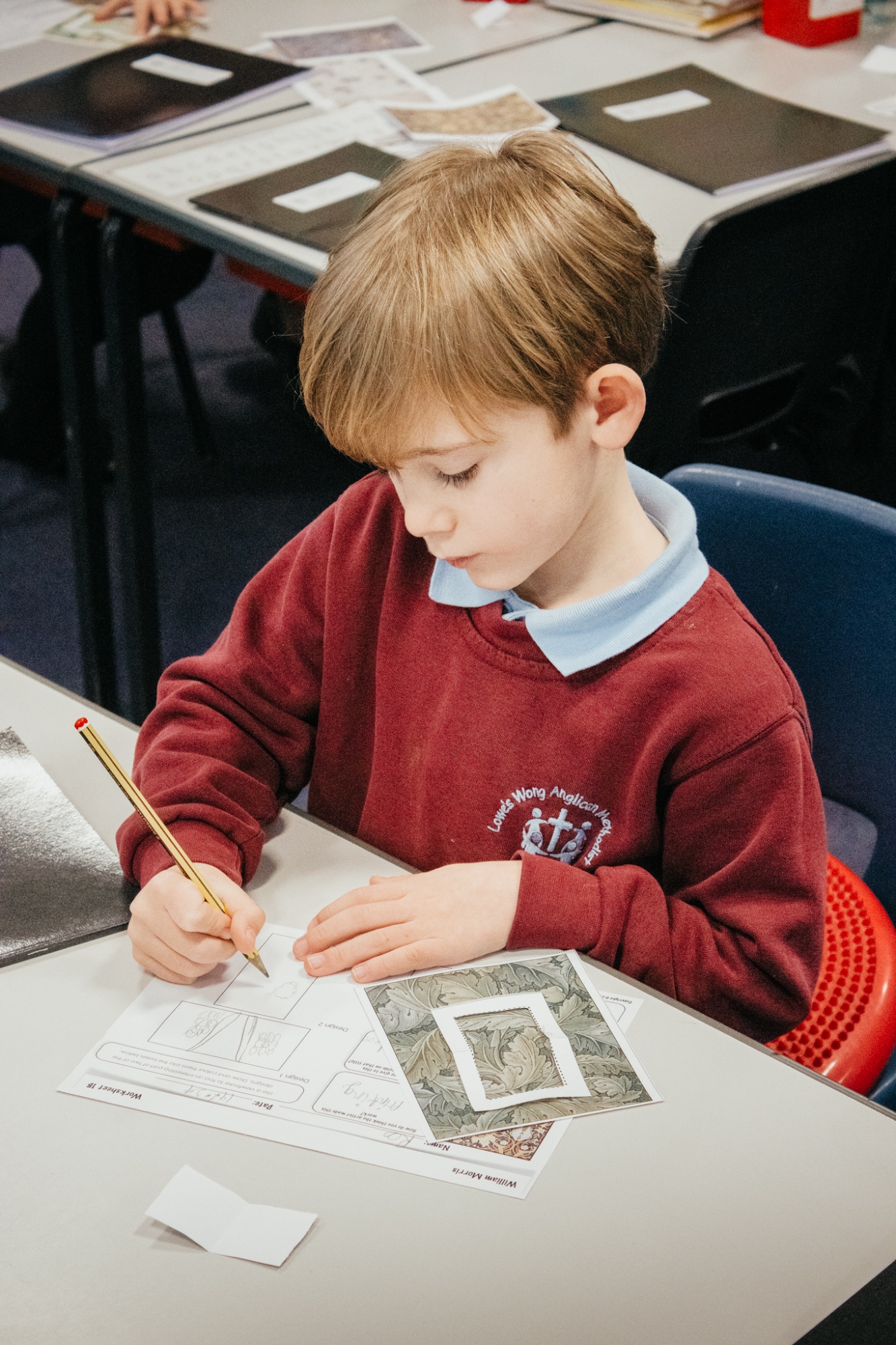 student completing worksheet